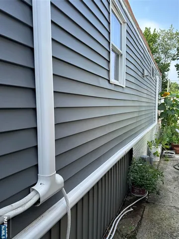 a view of a back yard of the house
