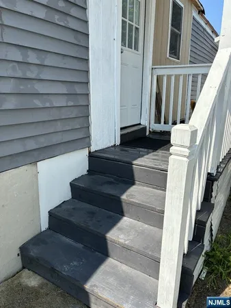 a view of entryway with a front door