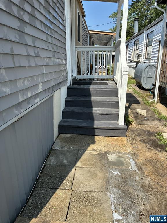 15 2nd Street Lodi, NJ 07644 - Photo 4 of 32 a view of entryway with wooden floor