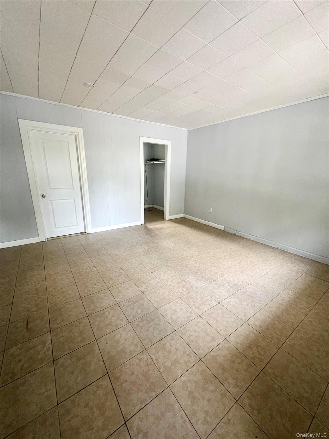 1612-1616 Rte 9W, Unit 17 Milton, NY 12547 - Photo 2 of 7 a view of an empty room with a window