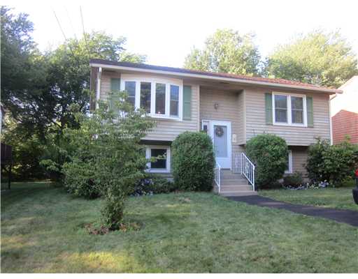 Exterior Front. Walk to water in this move in condition home!