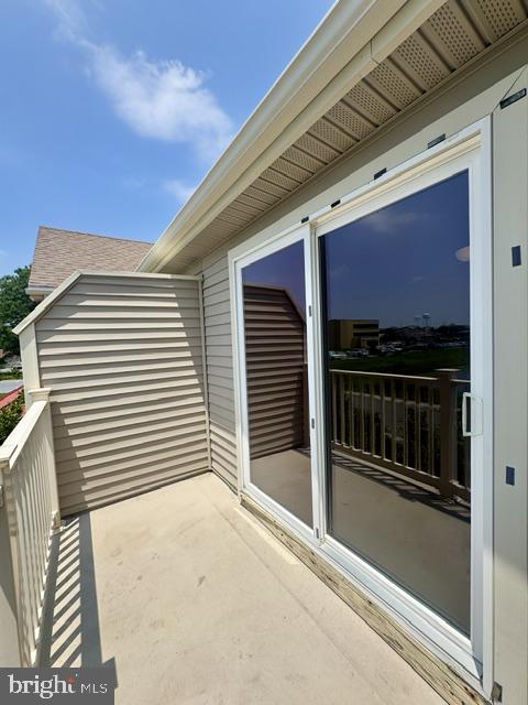 26497 Thunder Road Millsboro, DE 19966 - Photo 23 of 30 Sunny balcony with serene views.