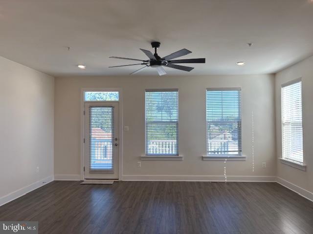 1 Taube Court Owings Mills, MD 21117 - Photo 14 of 36 a view of an empty room with wooden floor and a window