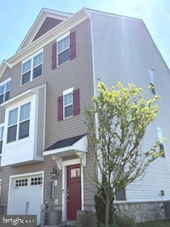 1 Taube Court Owings Mills, MD 21117 - Photo 2 of 36 a front view of a building