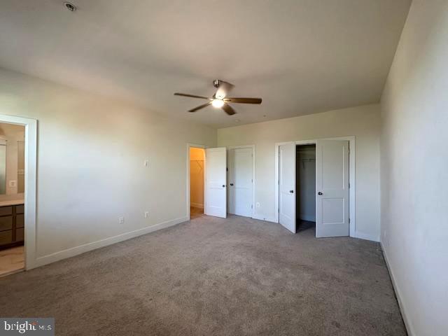 1 Taube Court Owings Mills, MD 21117 - Photo 21 of 36 a view of an empty room with a ceiling fan