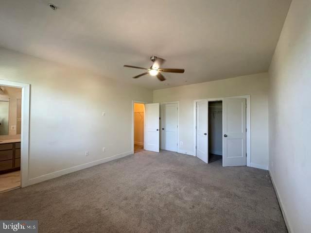 1 Taube Court Owings Mills, MD 21117 - Photo 22 of 36 a view of an empty room with a ceiling fan