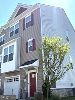 1 Taube Court Owings Mills, MD 21117 - Photo 4 of 36 a front view of a building