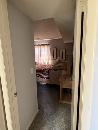 a view of livingroom with furniture and window