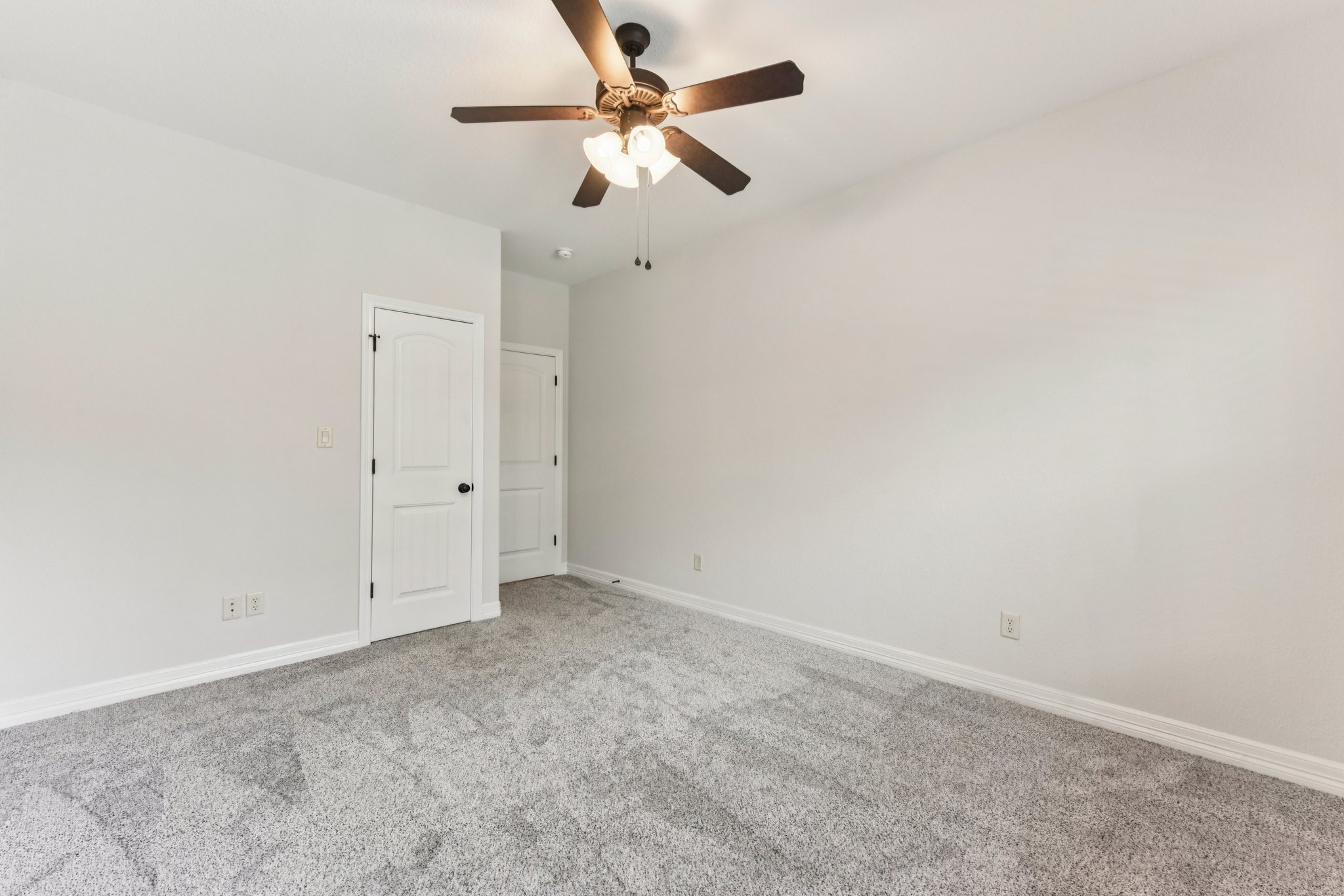 105 Silver Leaf Drive Georgetown, TX 78633 - Photo 26 of 40 an empty room with a chandelier fan