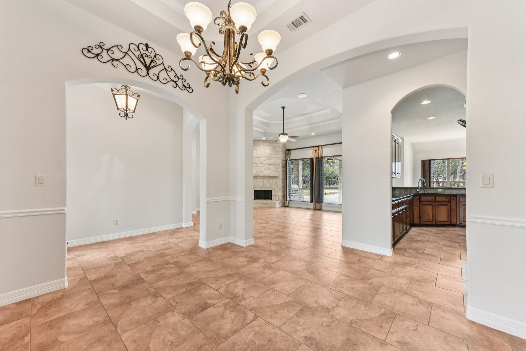 105 Silver Leaf Drive Georgetown, TX 78633 - Photo 3 of 40 a view of a hallway with a chandelier