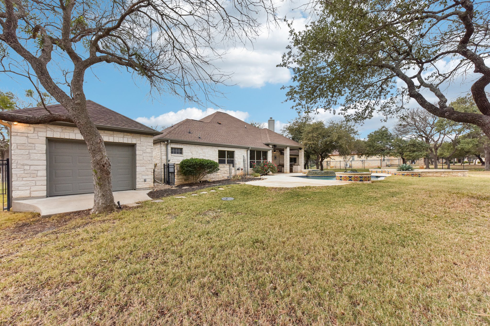105 Silver Leaf Drive Georgetown, TX 78633 - Photo 36 of 40 a house with swimming pool in front of it