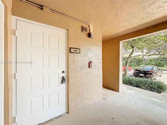 a view of a hallway with closet area