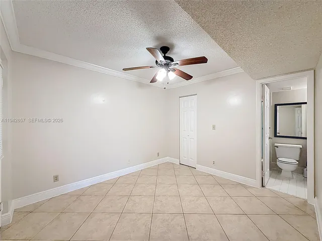a view of storage and utility room with washer and dryer