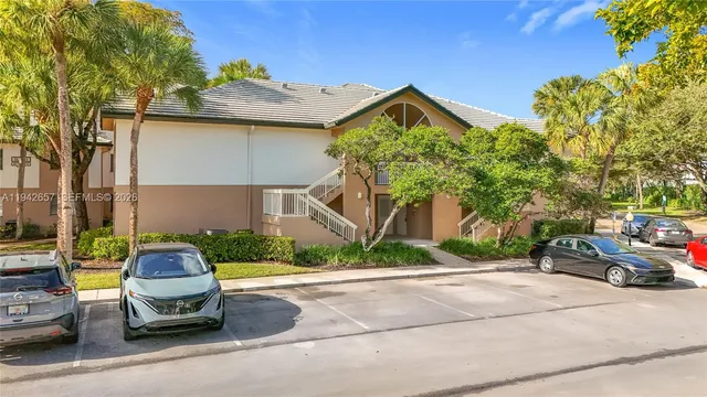 a car parked in front of a house
