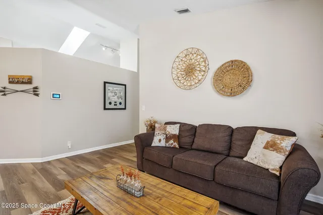a living room with furniture and a couch