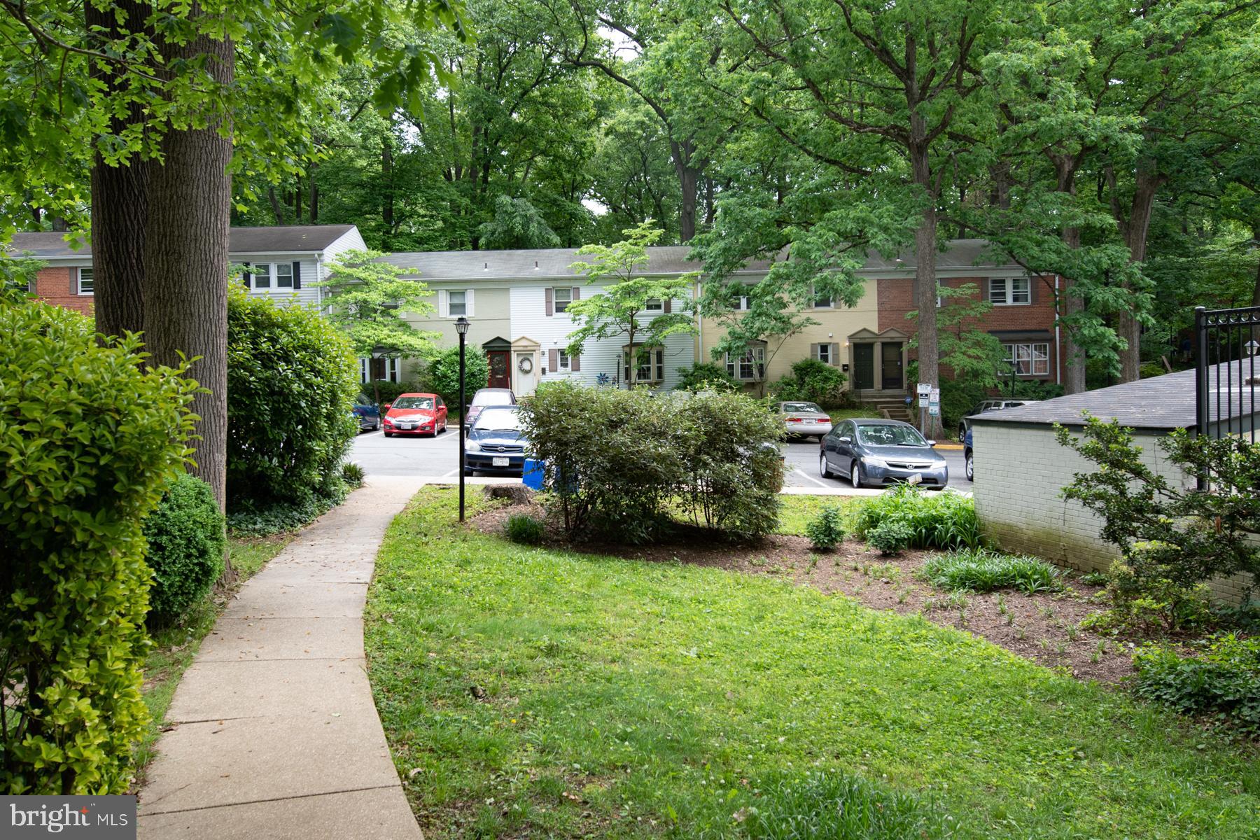 8603 Bradford Road, Unit 105 Silver Spring, MD 20901 - Photo 6 of 36 a view of a back yard