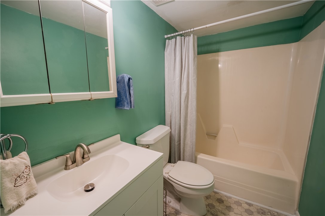 150 Ligon Street, Unit 2302 Clemson, SC 29631 - Photo 9 of 18 This bright bathroom features a vanity, toilet, and a combined shower and bathtub for daily routines.