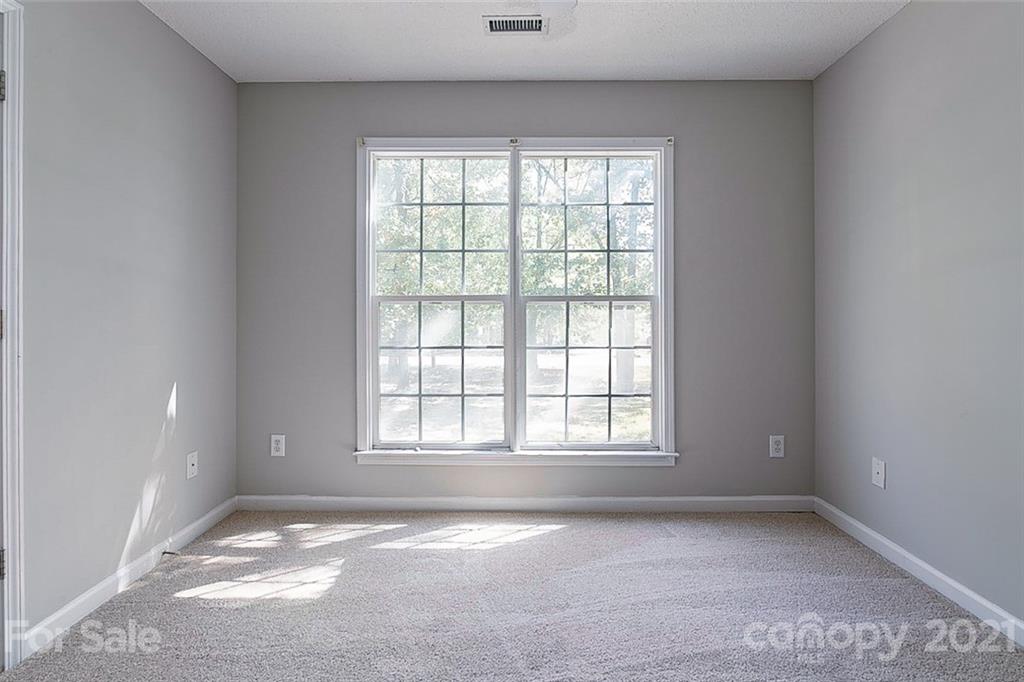 1323 Tucker Road Monroe, NC 28110 - Photo 12 of 17 an empty room with a window
