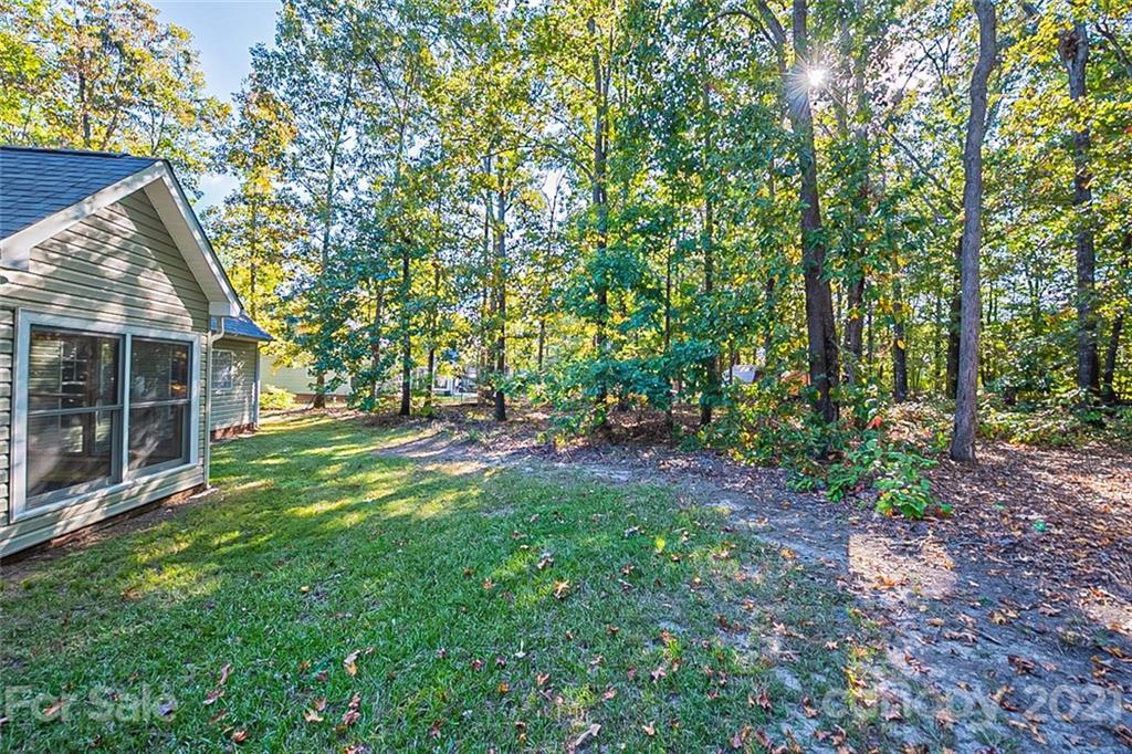 1323 Tucker Road Monroe, NC 28110 - Photo 17 of 17 a view of backyard with green space