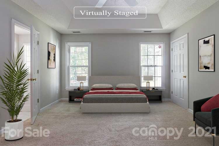 1323 Tucker Road Monroe, NC 28110 - Photo 8 of 17 a spacious bedroom with a bed and a window