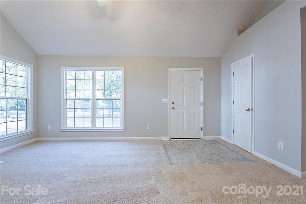 1323 Tucker Road Monroe, NC 28110 - Photo 10 of 17 a view of an empty room with a window