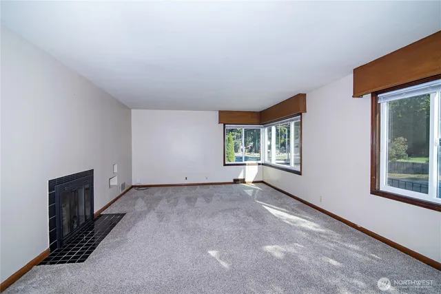 an empty room with windows