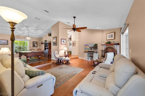 a very nice looking living room with a large window