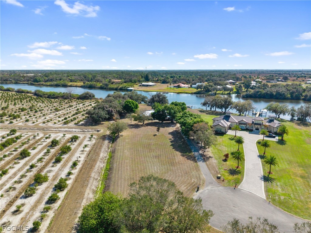 5997 Dragoon Court Fort Denaud, FL 33935 - Photo 34 of 49 a view of a lake with outdoor space