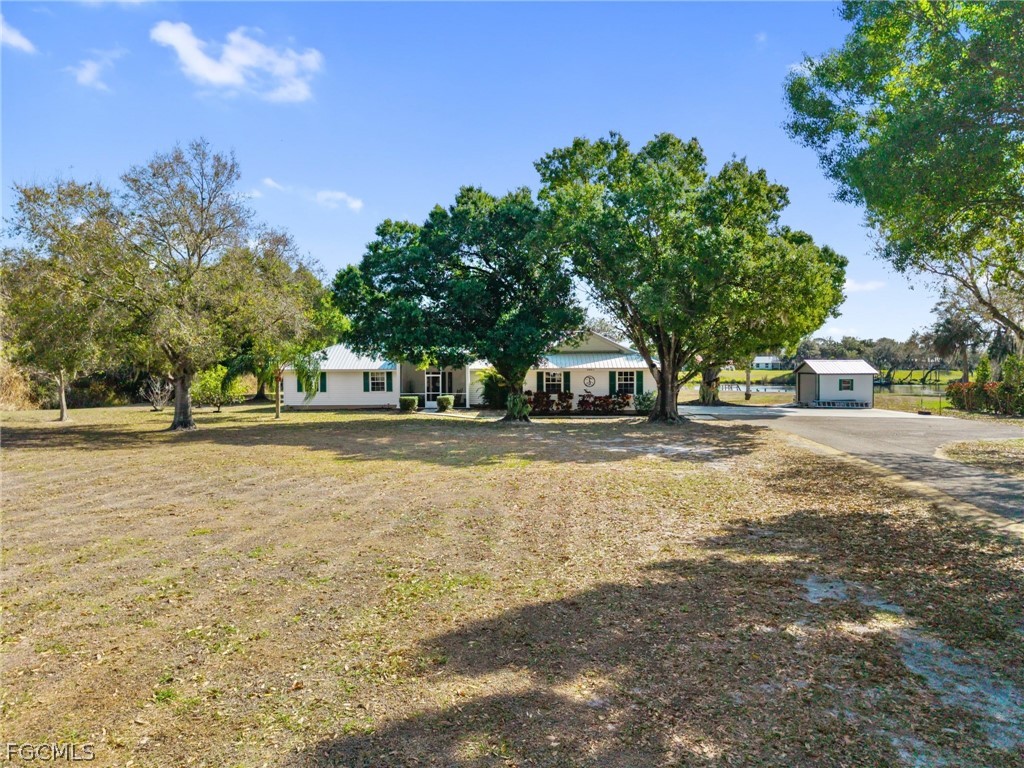 5997 Dragoon Court Fort Denaud, FL 33935 - Photo 44 of 49 a house view with outdoor space