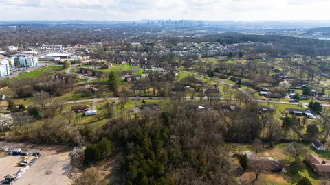 a view of backyard with green space