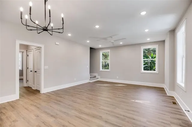 a bedroom with bed and a window
