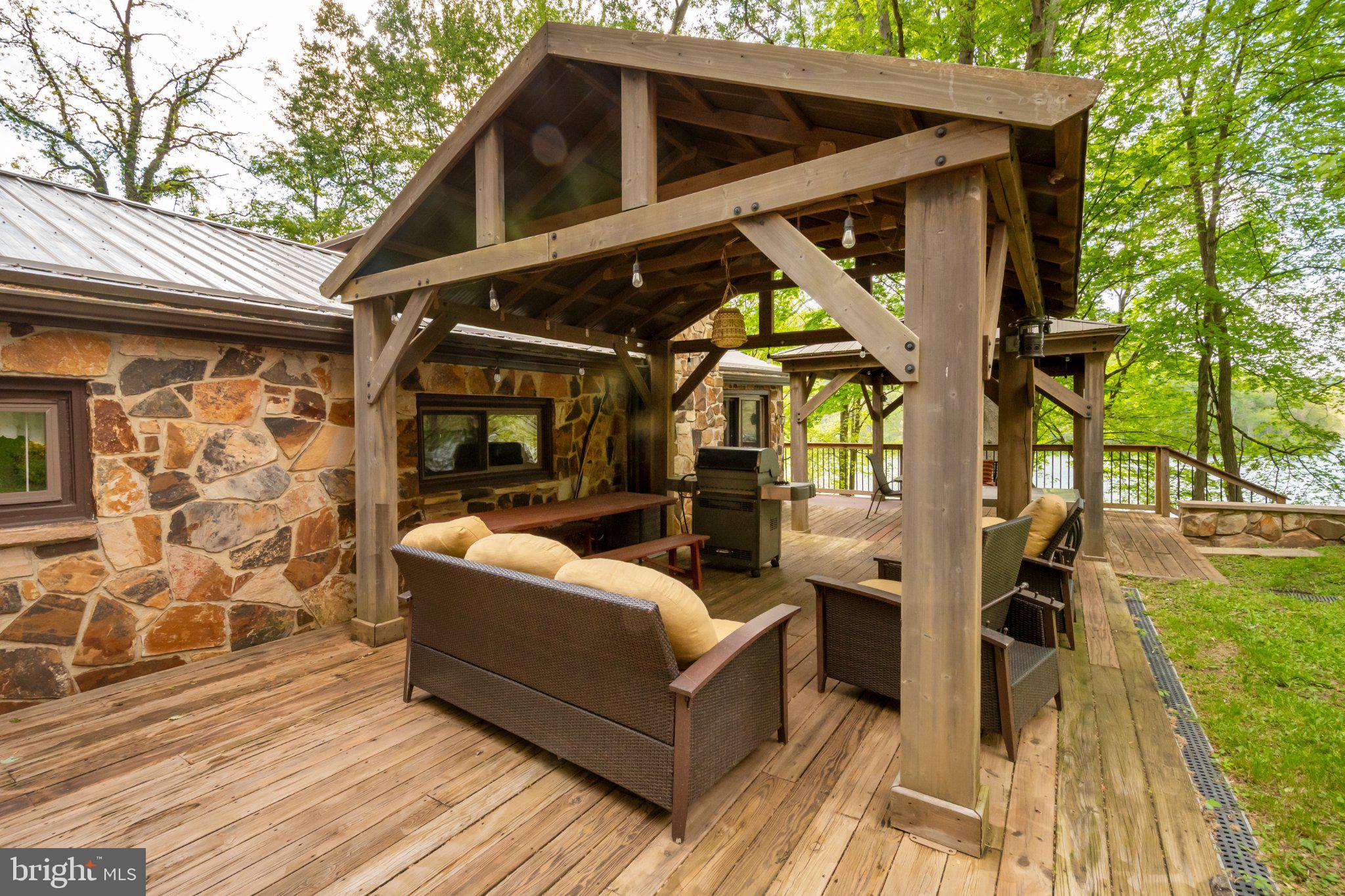 750 Lake Side Road Addison, PA 15411 - Photo 16 of 51 Charming outdoor retreat by the lake.