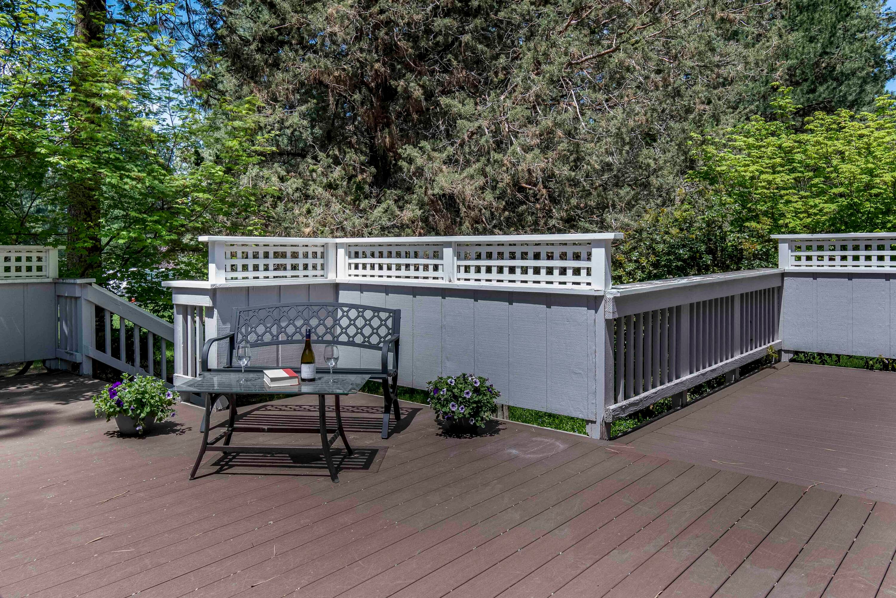20410 Mainline Road Bend, OR 97702 - Photo 24 of 33 Large composite deck off the back side of the home and master bedroom