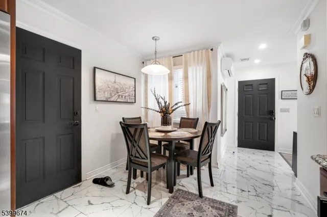 a view of a dining room with furniture
