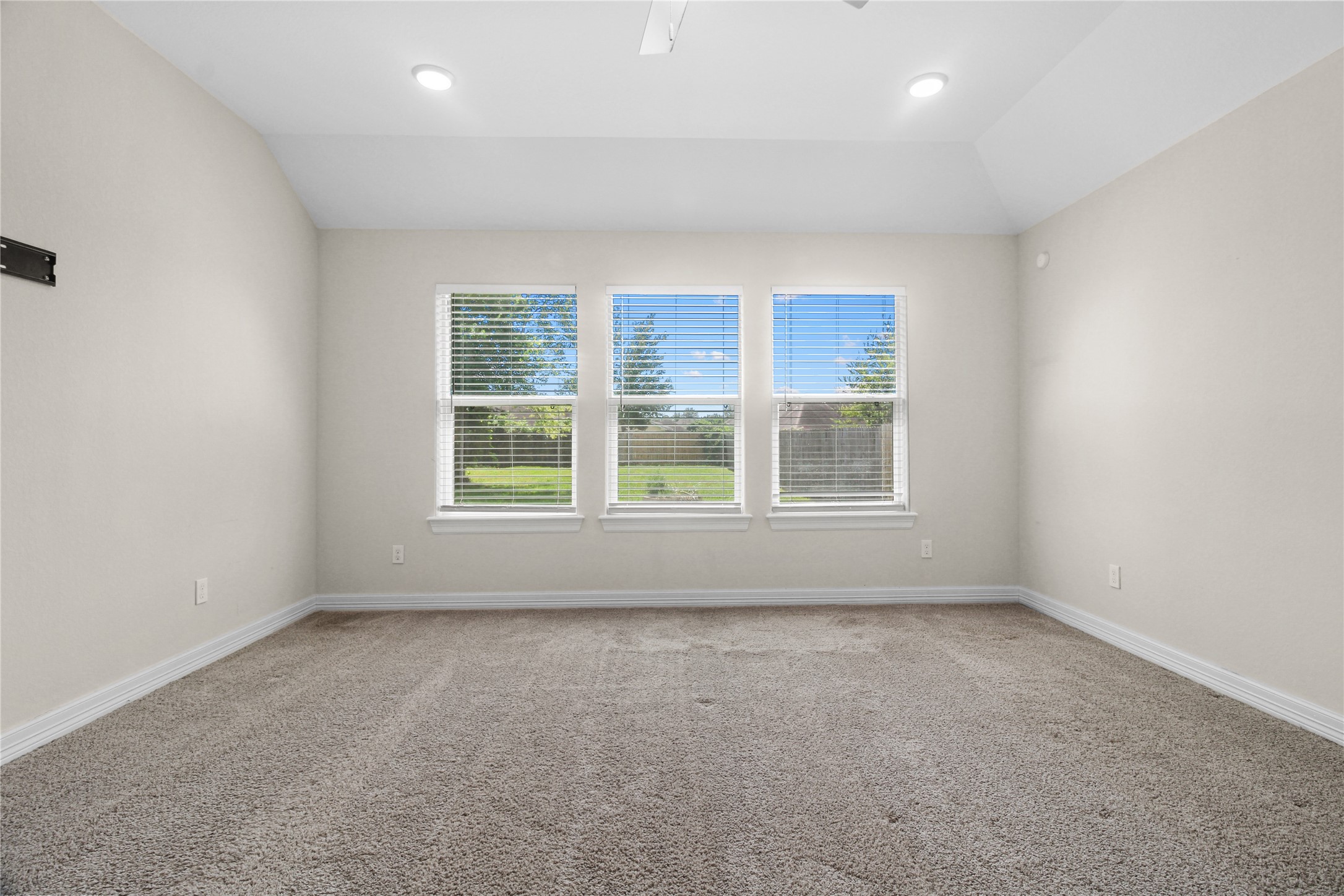 1208 East Henderson Road Angleton, TX 77515 - Photo 12 of 29 an empty room with a window