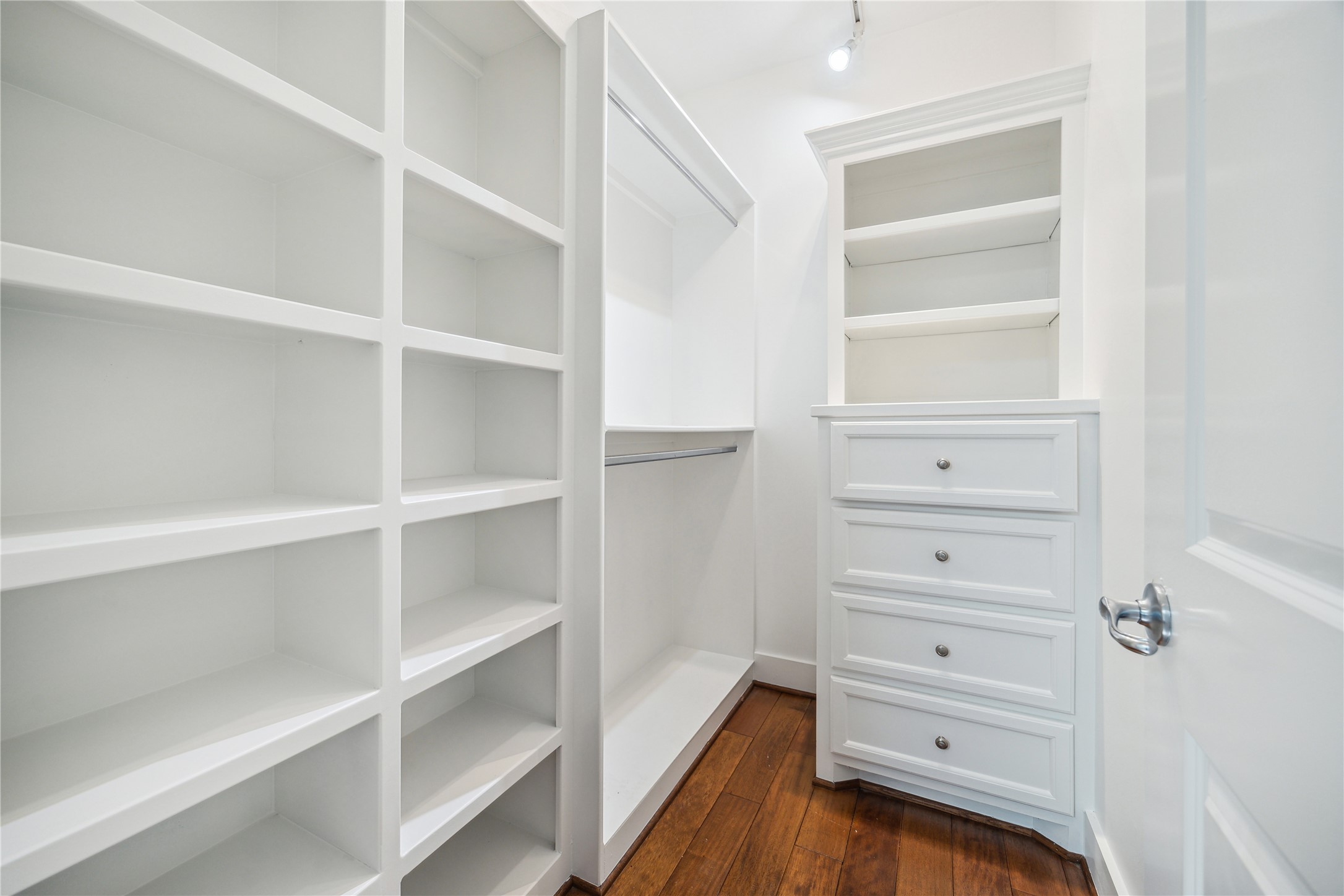 1238 West 22nd Street Houston, TX 77008 - Photo 12 of 43 Large coat closet and storage area (8x5) across from the office (1st floor) with custom shelving and drawers