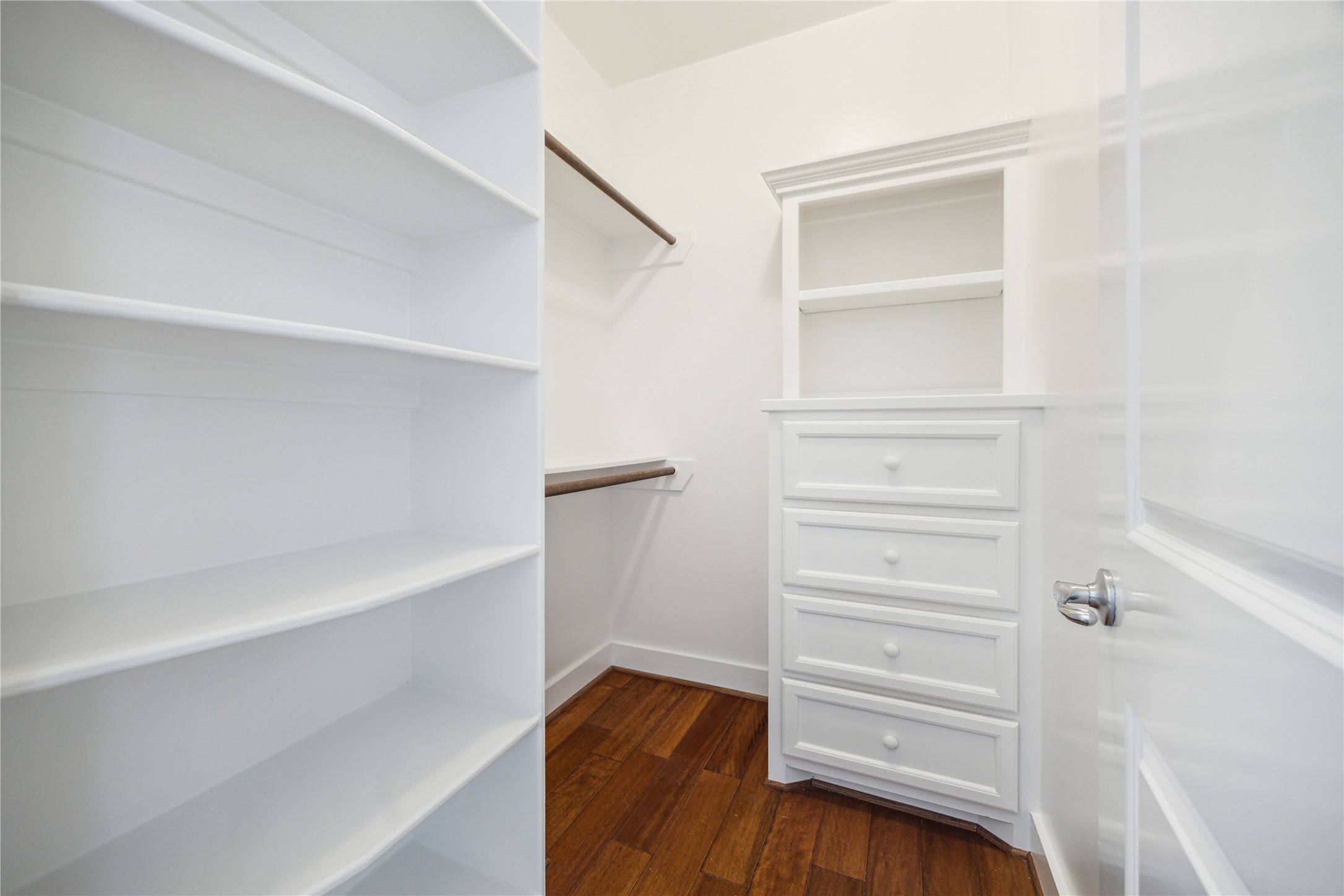 1238 West 22nd Street Houston, TX 77008 - Photo 24 of 43 Walk-in closet (7x6) in the 2nd bedroom features custom shelving and drawers.