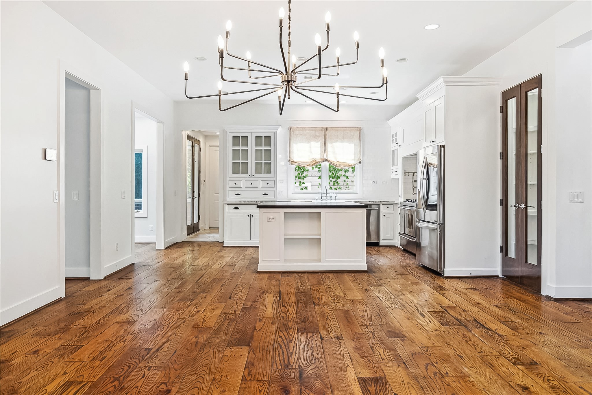 1238 West 22nd Street Houston, TX 77008 - Photo 39 of 43 The space is perfect for a larger table beneath the grand chandelier