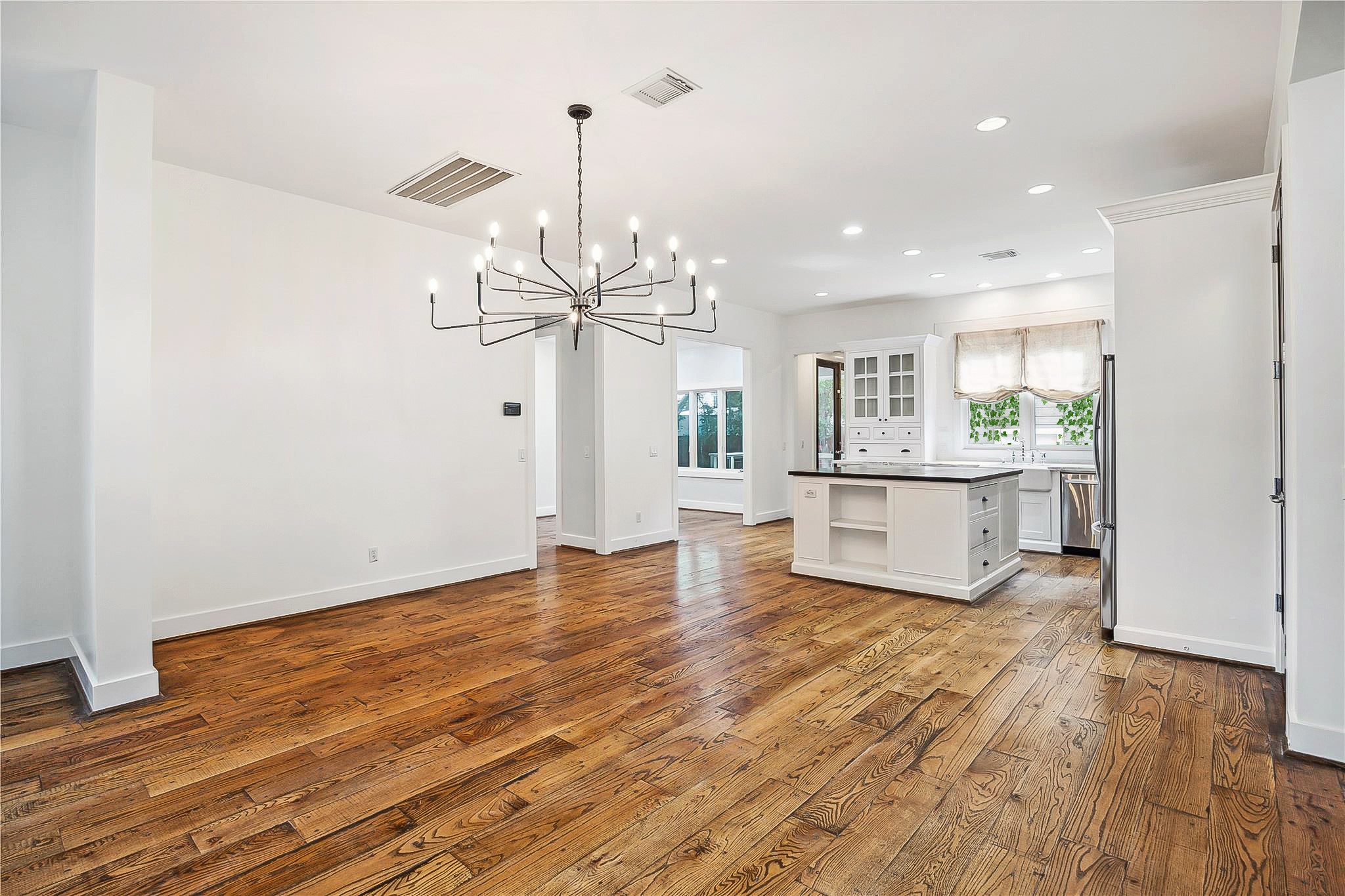 1238 West 22nd Street Houston, TX 77008 - Photo 6 of 43 View from the front door looking into the dining room (17x14), kitchen (17x15), and office (12x10).