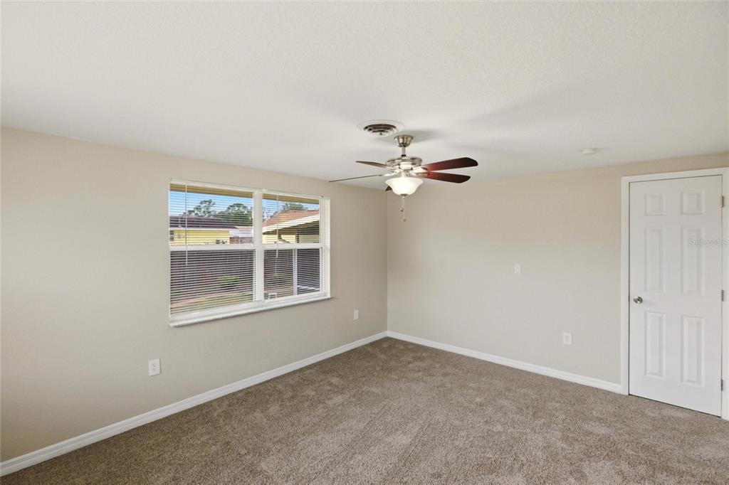 1107 Seneca Road Venice, FL 34293 - Photo 21 of 30 a view of empty room with window