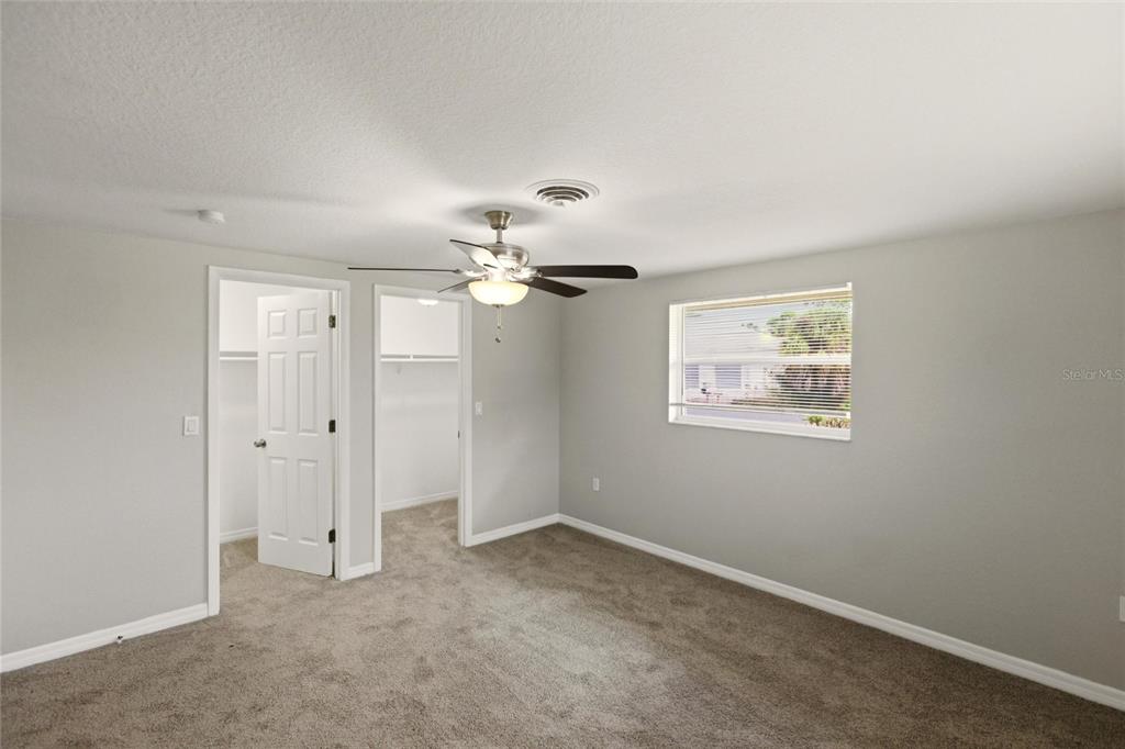 1107 Seneca Road Venice, FL 34293 - Photo 24 of 30 wooden floor in an empty room with a window