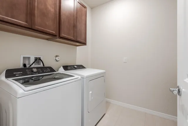 a bathroom with a sink vanity and a mirror