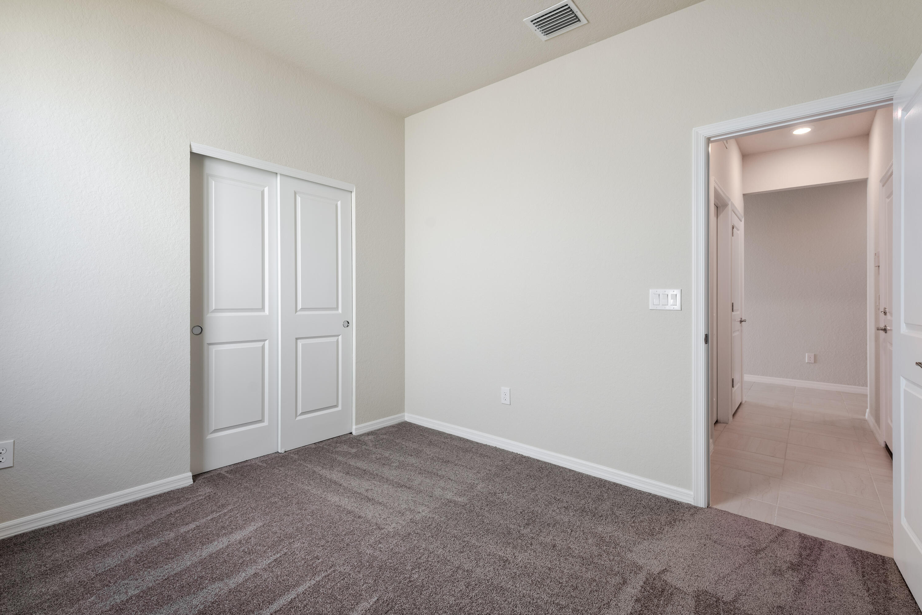 12327 Southwest Sand Dollar Way Port St. Lucie, FL 34987 - Photo 14 of 29 a view of an empty room