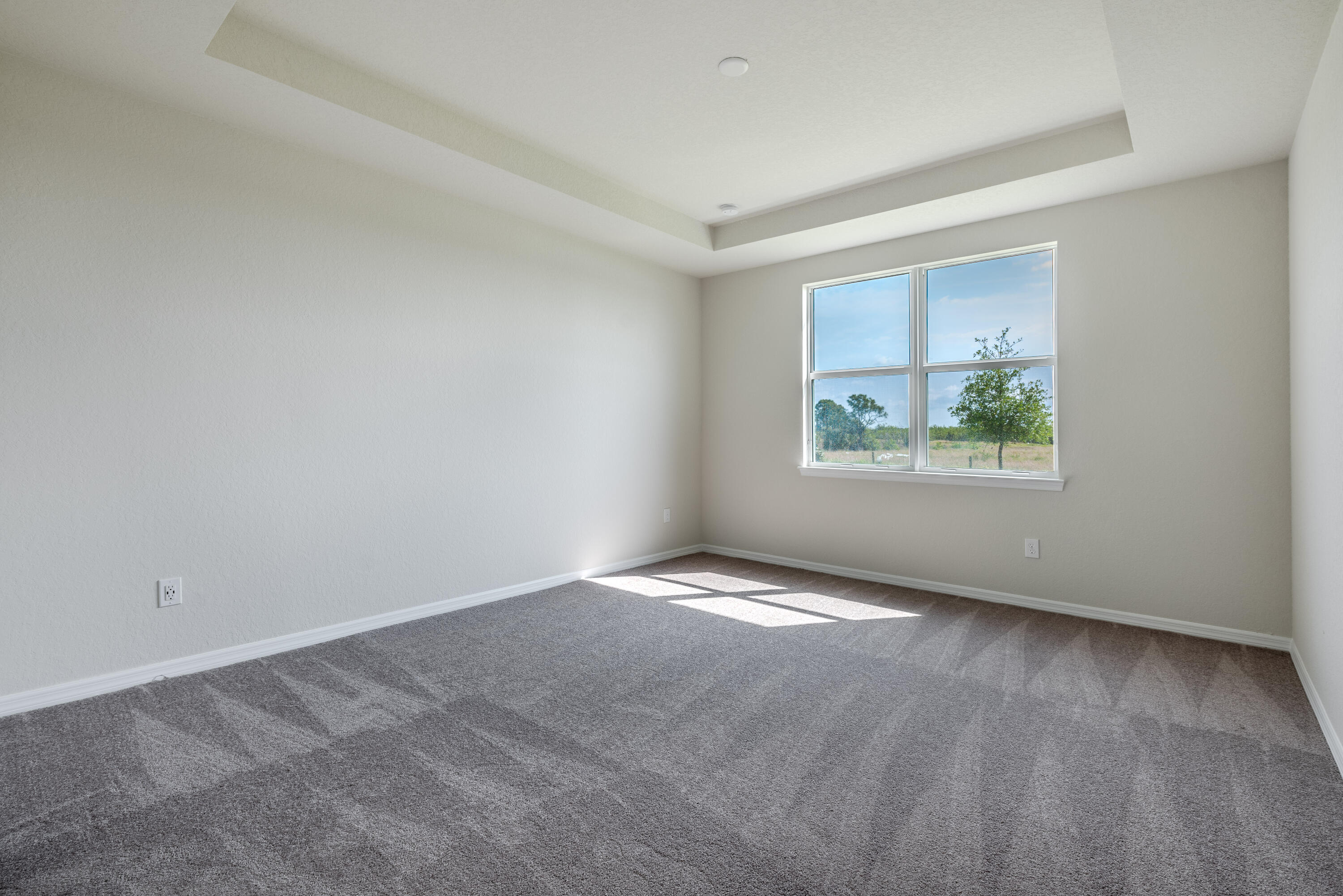 12327 Southwest Sand Dollar Way Port St. Lucie, FL 34987 - Photo 16 of 29 an empty room with windows
