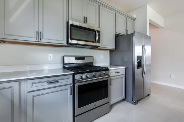a kitchen with a cabinets and counter space
