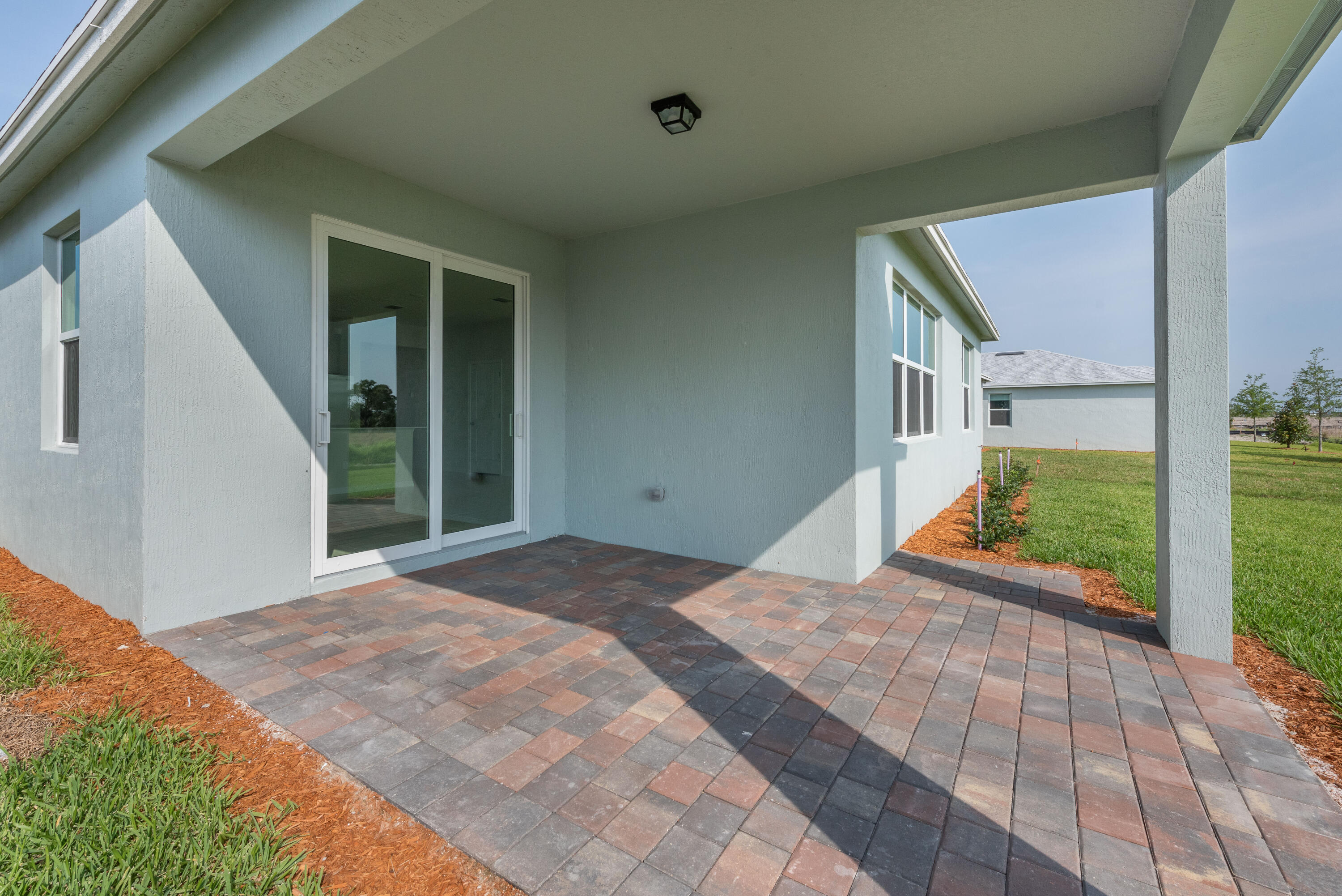 12327 Southwest Sand Dollar Way Port St. Lucie, FL 34987 - Photo 29 of 29 a view of a house with a porch