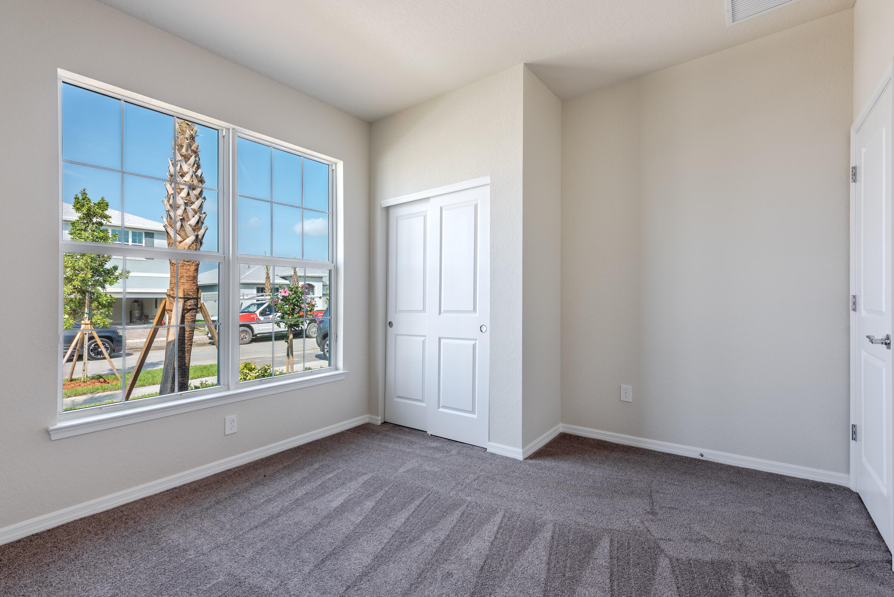 12327 Southwest Sand Dollar Way Port St. Lucie, FL 34987 - Photo 5 of 29 a view of an empty room and a window