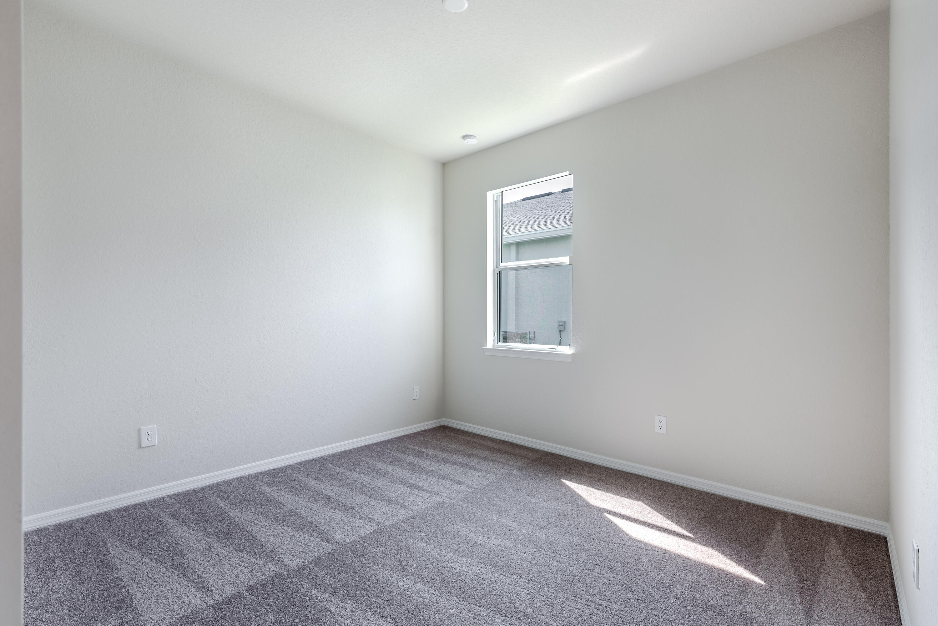 12327 Southwest Sand Dollar Way Port St. Lucie, FL 34987 - Photo 8 of 29 a view of an empty room with a window