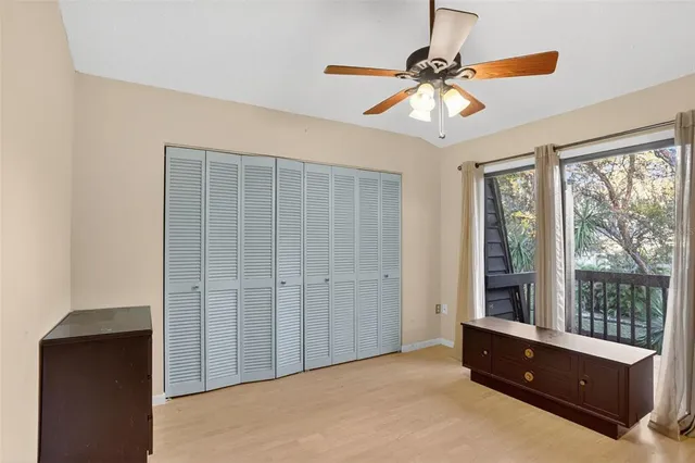 a room with a closet and a window