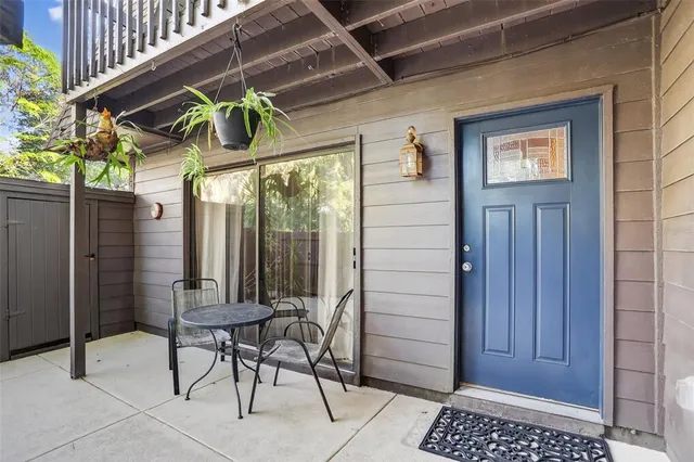 a kitchen with stainless steel appliances granite countertop a sink and a stove